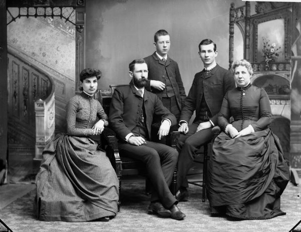 Portrait of the Smith family taken at Goodman Studio. Left to Right: Sarah Tallmadge, Frank Tallmadge, Uncle Edgar (Smith), Uncle Howard (Smith), Grandmother (Smith).