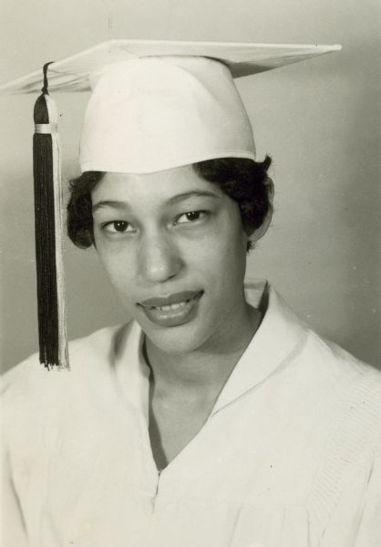 Carlotta Walls, one of the Little Rock Nine, in graduation cap and gown.