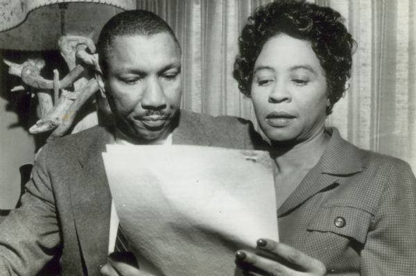 Daisy Bates confers with NAACP lawyer Robert Carter, after she was fined $100 and court costs of $150 for failure to open confidential NAACP financial and membership records in compliance with the city ordinance.