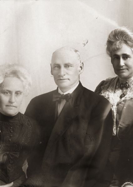 Members of the Klauber Family of Madison. Moses Klauber is in the middle, Mrs. Lena Klauber on left, and Miss Sophie Klauber on right (sisters).
