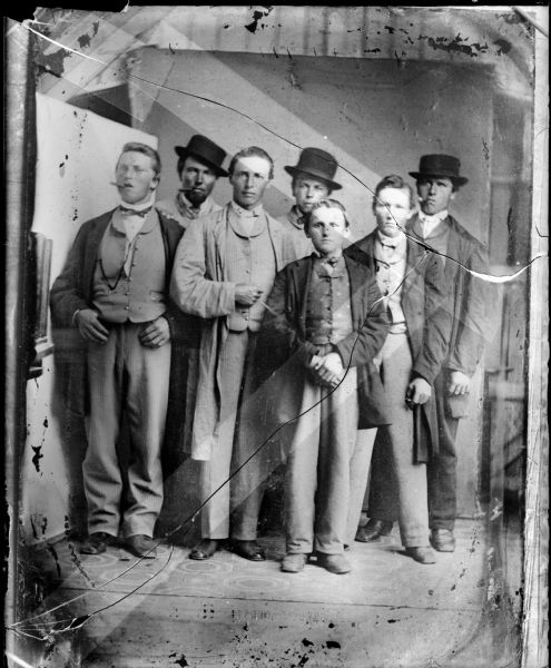 August Krueger with group of sailors(?).