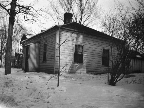 The John Winslade residence, 445 West Wilson Street. The home was built in the 1840's by Mr. Winslade, who was one of the workmen who built the first Wisconsin State Capitol.
