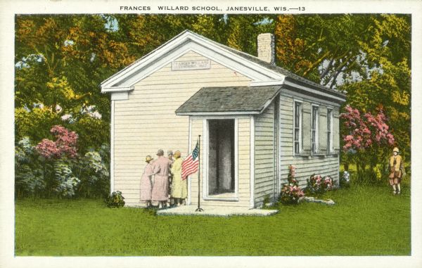 Colorized postcard of an exterior view of the Frances Willard School with an American flag near the front door. Caption reads: "Frances Willard School, Janesville, Wis."