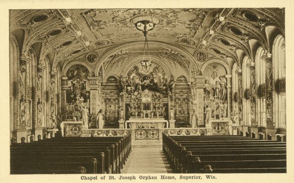 Interior view looking toward the altar. Caption reads: "Chapel of St. Joseph Orphan Home, Superior, Wis."