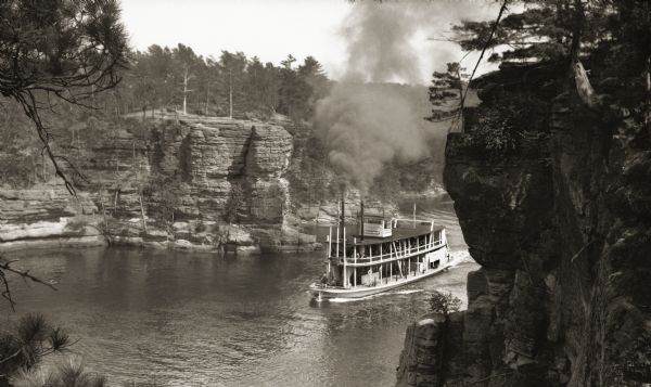 Second to last steamboat on the river taken before 1931, burned in 1931. Taken from Romance Cliff, "The Apollo" is shown coming through with smoke billowing out the top of the double smokestacks.