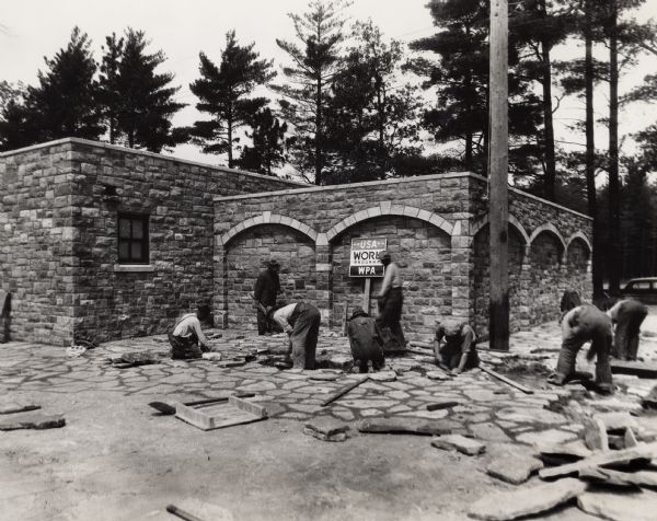 A Works Progress Administration (WPA) crew at work laying a stone terrace in Stevens Point.