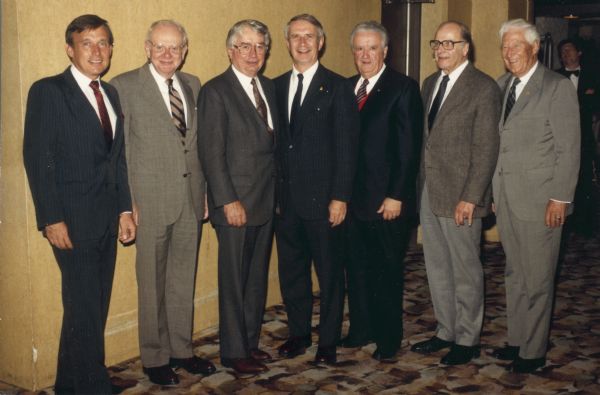 A reunion photograph of Wisconsin's living governors taken sometime during the administration of Governor Anthony Earl.  From left to right they are: Martin Schreiber, John Reynolds, Patrick Lucey, Lee Dreyfus, Gaylord Nelson, and Warren Knowles.