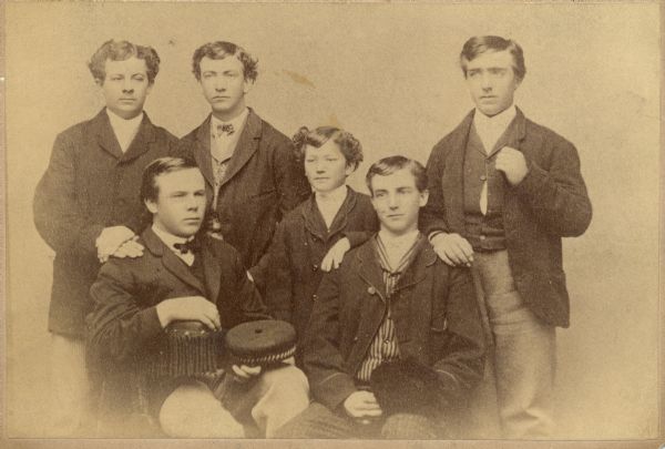 Portrait of six young men who were boarders at Nancy Smith's. A 14-year-old Robert M. La Follette stands in the center.