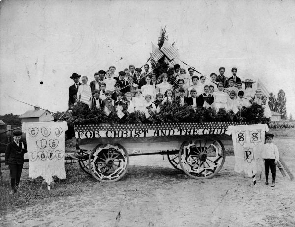 Children on a decorated wagon during a Sunday school picnic of Caersalem Welsh Church.