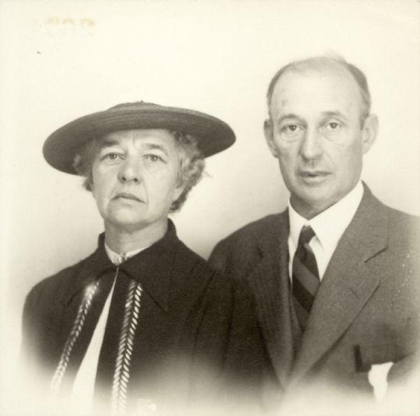 Quarter-length studio portrait of Arthur Page and (presumably) his wife, who is wearing a hat.