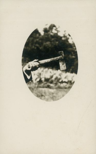 Hatchet probably used in slayings of Mamah Borthwick, her children, and others at Taliesin by Julian Carlton. Taliesin is located in the vicinity of Spring Green, Wisconsin.