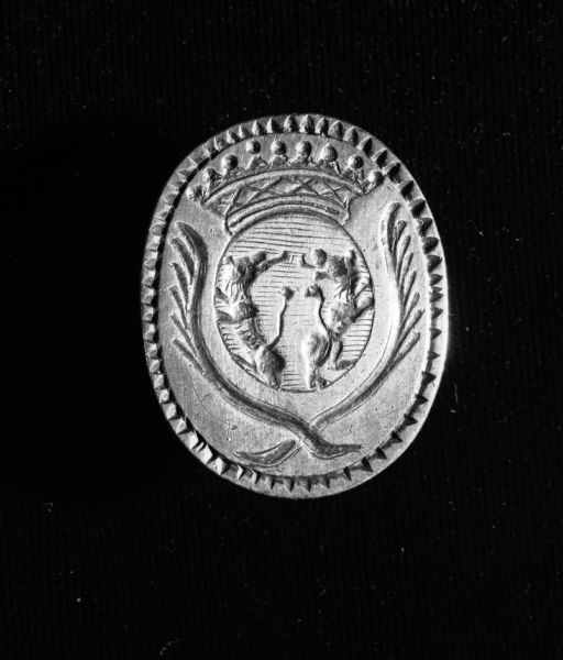 A silver letter seal, which belonged to Charles Langlade.