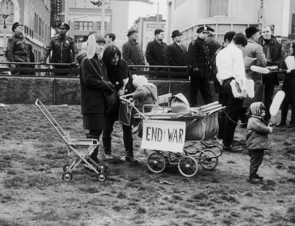 Mothers and infants at a demonstration against the war in Vietnam.