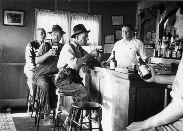 Men drinking in the bar at Stubb's Tavern.