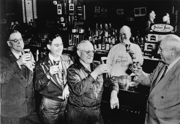 Informal picture taken in a bar in Potosi, at which are standing five cousins who operated the Potosi Brewery.  They are left to right: Adolph Schumacher, Adam Schumacher, Rudolph Schmacher, George Meier, and Walter Schumacher.