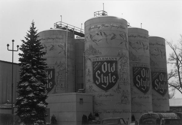 Tanks at the Heileman Brewing Company decorated to look like a six-pack of beer cans.