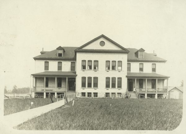 Exterior view of the Keshena Schoolhouse.