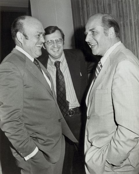 Candid portrait of three Wisconsin legislators sharing a light moment. Left to right, they are: Melvin Laird, who resigned from his congressional seat in January, 1969 to become secretary of defense; David Obey, who succeeded to Laird's seat; and Senator Gaylord Nelson, who served from 1963 to 1981. The three men were in Marshfield to speak to a meeting of Wisconsin surgeons on the future of government's role in health care.