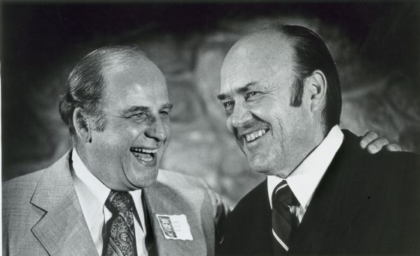 A close-up of the two politicians sharing a laugh at the Wisconsin State Senate Alumni Reunion, held at the Park Motor Inn.