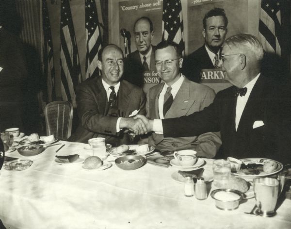 Men gather for a banquet on the occasion of a visit by Adlai Stevenson, Democratic Candidate for President. Stevenson on left.