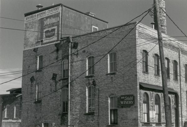 Effinger Brewery located in Baraboo. Founded about 1870, this brewery was operating as the Stiehl Winery in 1977 when this photograph was taken. A sign on the building still advertised Gettleman Beer.