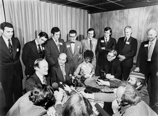 Seated at a table from left to right are: Hubert Humphrey, Gaylord Nelson, Shirley Chisholm, and Robert Cornell. David Obey and Alvin Baldus are in the back row among other guests.