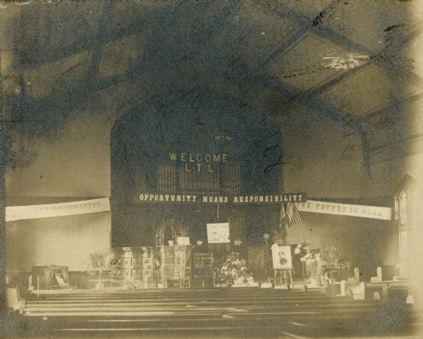 Decorations in the Methodist Episcopal Church of Monroe where the Wisconsin Loyal Temperance League met for its annual convention in 1901.  A portrait of national temperance leader Frances Willard, who was raised in Janesville, can be seen on an easel near the front.