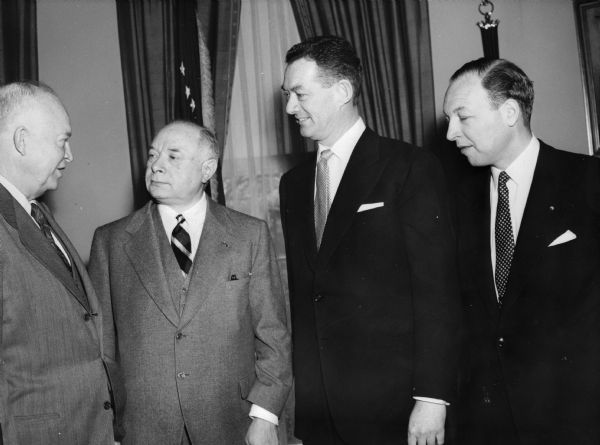 Dwight Eisenhower stands with David Sarnoff, Robert Sarnoff and Sylvester "Pat" Weaver.