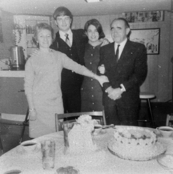 From left: Flora van Brink Hony Bader (nee Melkman), son-in-law Fred, daughter Anneke, and husband Aron Bader in a dining room.