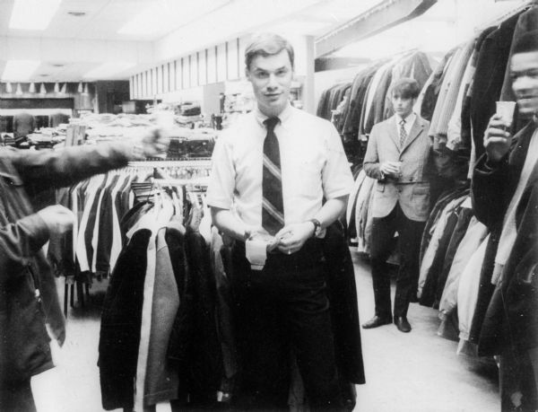 Edward Deutschkron (son of Eva Lauffer Deutschkron and Martin Deutschkron) working as a salesman at the family's store, Martin's, 427 State Street.