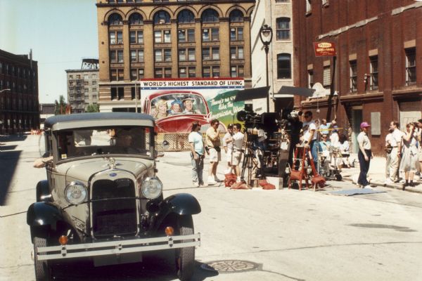 Film crew on street for "Dillinger," a made-for-TV movie shot in Milwaukee's Third Ward.