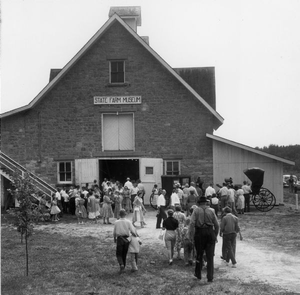 Part of a crowd of over 3000 that toured Stonefield, the Historical Society's site at Cassville, during an open house.  The building that housed the State Farm Museum was originally the barn of Nelson Dewey's estate.