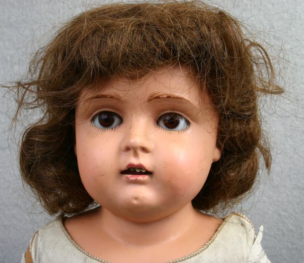 Close-up of the face of a Dainty Dorothy doll.
