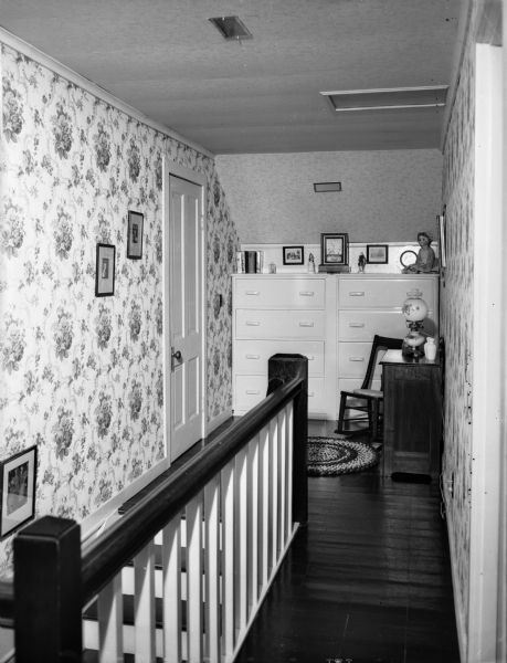 Interior of the Winfield Martin house, 2906 Lakeland Avenue (earlier address: 611 Elmside Boulevard), showing the upstairs hall at the top of the stairway. Built as a carriage house for James and Minnie Corry in 1911, it was remodeled as a residence in 1946.