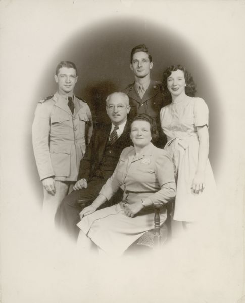 A formal studio portrait of David Susskind (on the left) with his parents and siblings.
