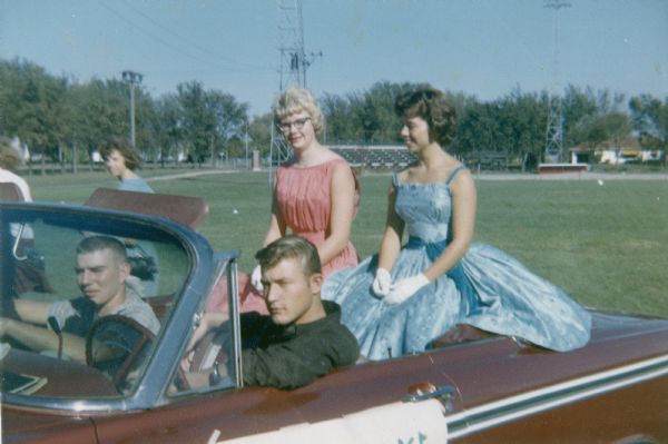 Curtis and his friend Pete Sandberg escort Queen of the prom, Marcy Smith and her friend (? Cole), alternate queen.