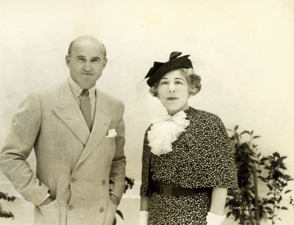 Samuel Goldwyn and Edna Ferber pose together wearing fashionable attire.
