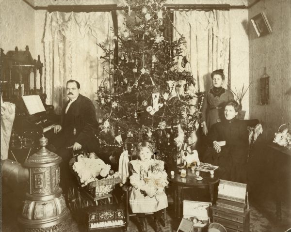 Family Around Christmas Tree | Photograph | Wisconsin Historical Society