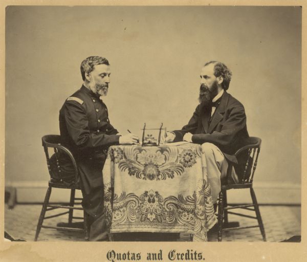 General Augustus Gaylord (seated right), the Adjutant-General of Wisconsin. Caption reads: "Quotas and Credits."