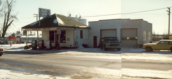 A Skelly station located on USH 10 consisting of a historic gas station and a two-bay service building.  Gasoline cost 96 cents per gallon for regular.