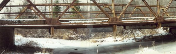 Bridge over the frozen Trappe River.