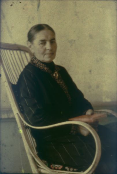 Autochrome of Anna Heim sitting in a rocking chair. Photograph made in Switzerland by Huns Haldecker, Anna's son-in-law.