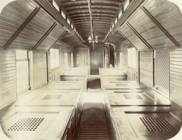Interior view of a fish stocking railroad car which transports fry to the hatchery.