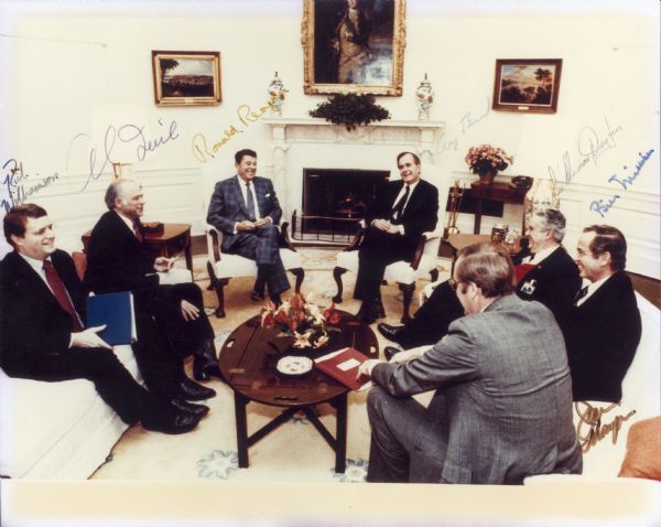 A meeting at the White House with the President and Vice President. From left to right are Rich Williamson, Al (autograph unclear), Ronald Reagan, George Bush, Lee Sherman Dreyfus, and two other men (whose autographs are unclear).
