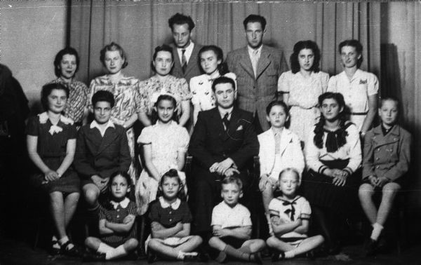 Magda Moses Herzberger (third row, fourth from the left) with her piano class in Cluj, Romania.