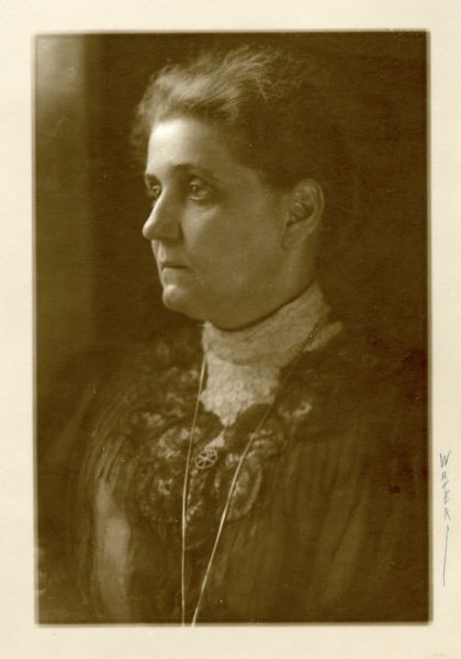 Portrait of Farmers' Institute Instructor, Nellie Maxwell. On right border of print the word "WATER" is handwritten, vertically.