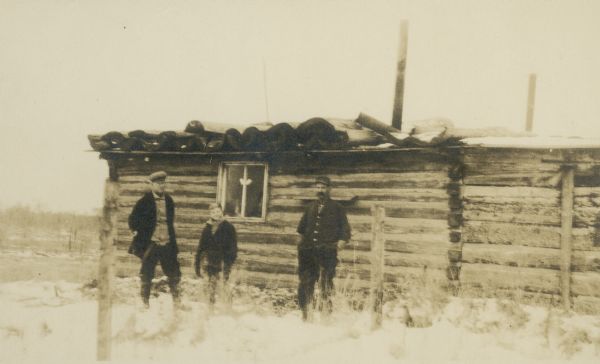 Cabin of John Deitz. Three persons shown are not members of the Dietz family.

John Deitz was known for the Cameron Dam incident in which Deitz and a Sawyer County, Wisconsin, posse engaged in a shoot-out in 1910.
