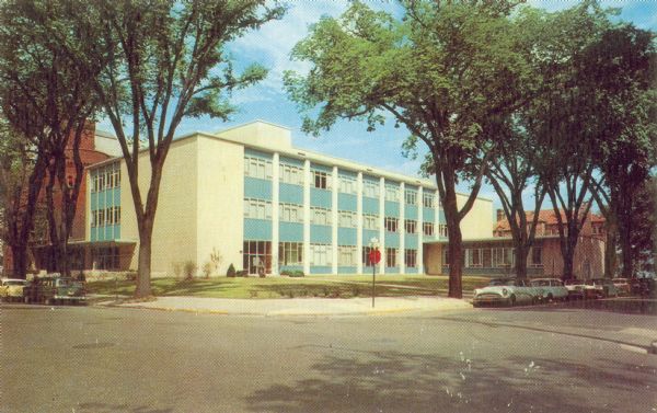 Color postcard of the exterior of the Wisconsin Center for adult education at 702 Langdon Street.