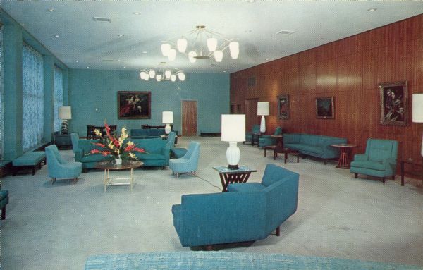 Interior view of the blue room known as the Special Lounge in the Wisconsin Center for adult education at 702 Langdon Street.