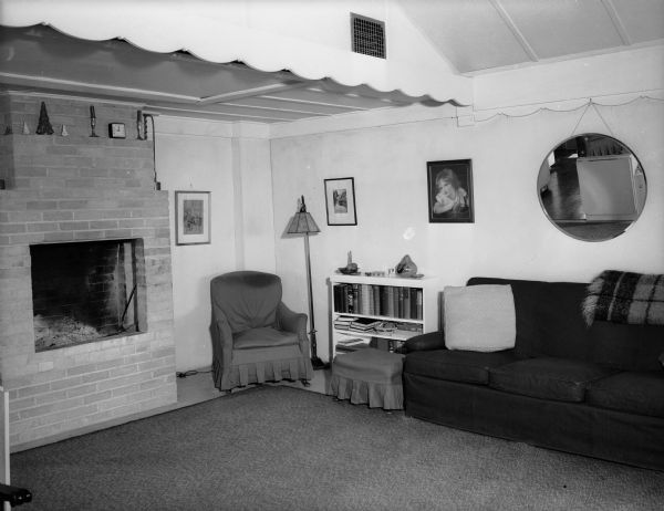 Interior view of the living room in the house of Professor Ruth B. Glassow at 1635 Norman Way. The house had been a barn on the estate of John R. Commons, a world-known University of Wisconsin economist.